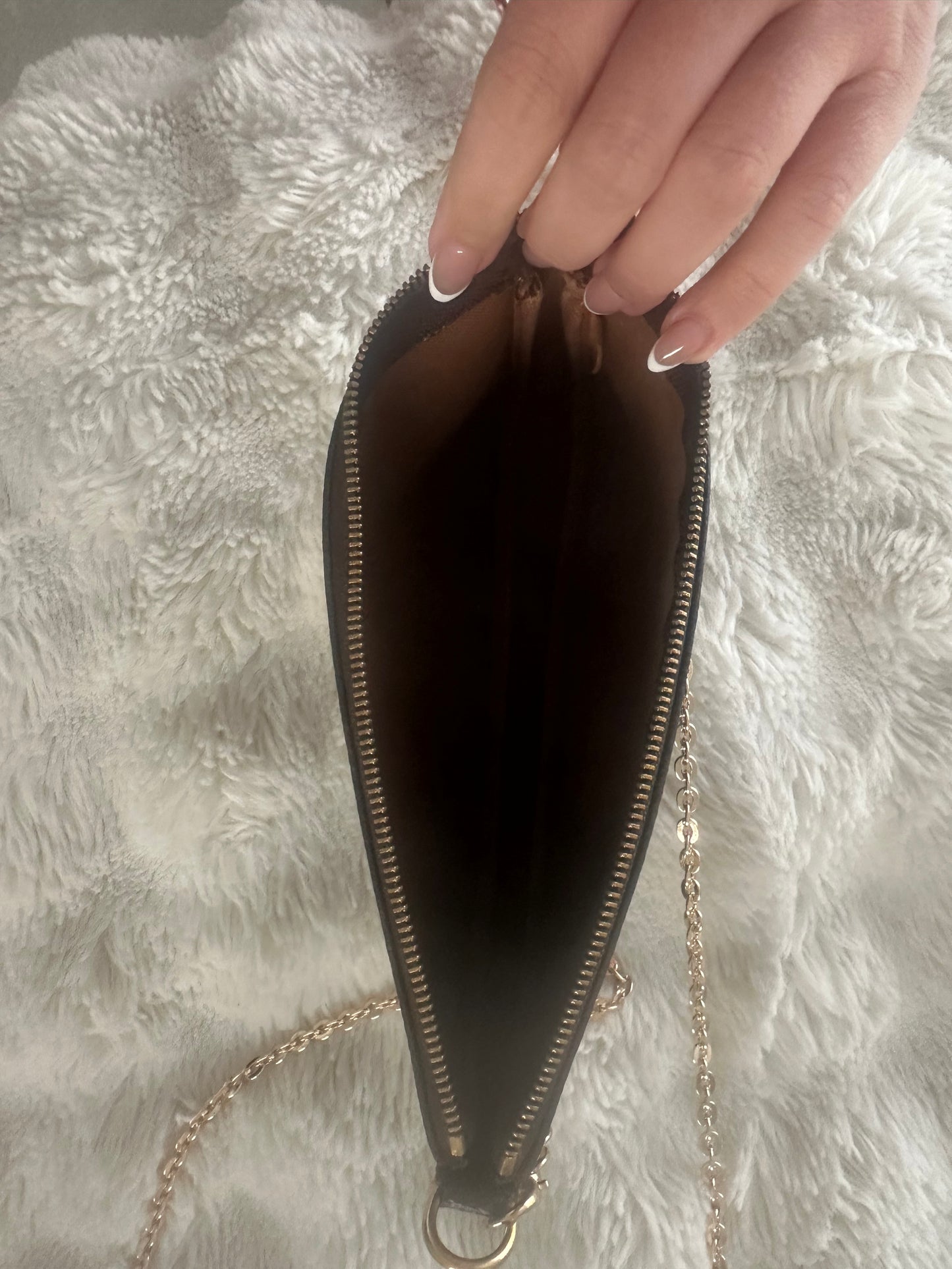 Louis Vuitton repaired Pochette Accessory bag cross body