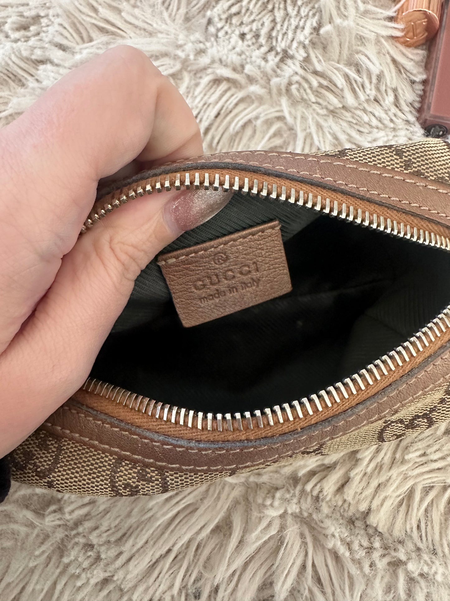 Gucci GG monogram cosmetic pouch with heart detail
