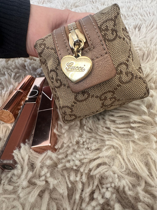 Gucci GG monogram cosmetic pouch with heart detail