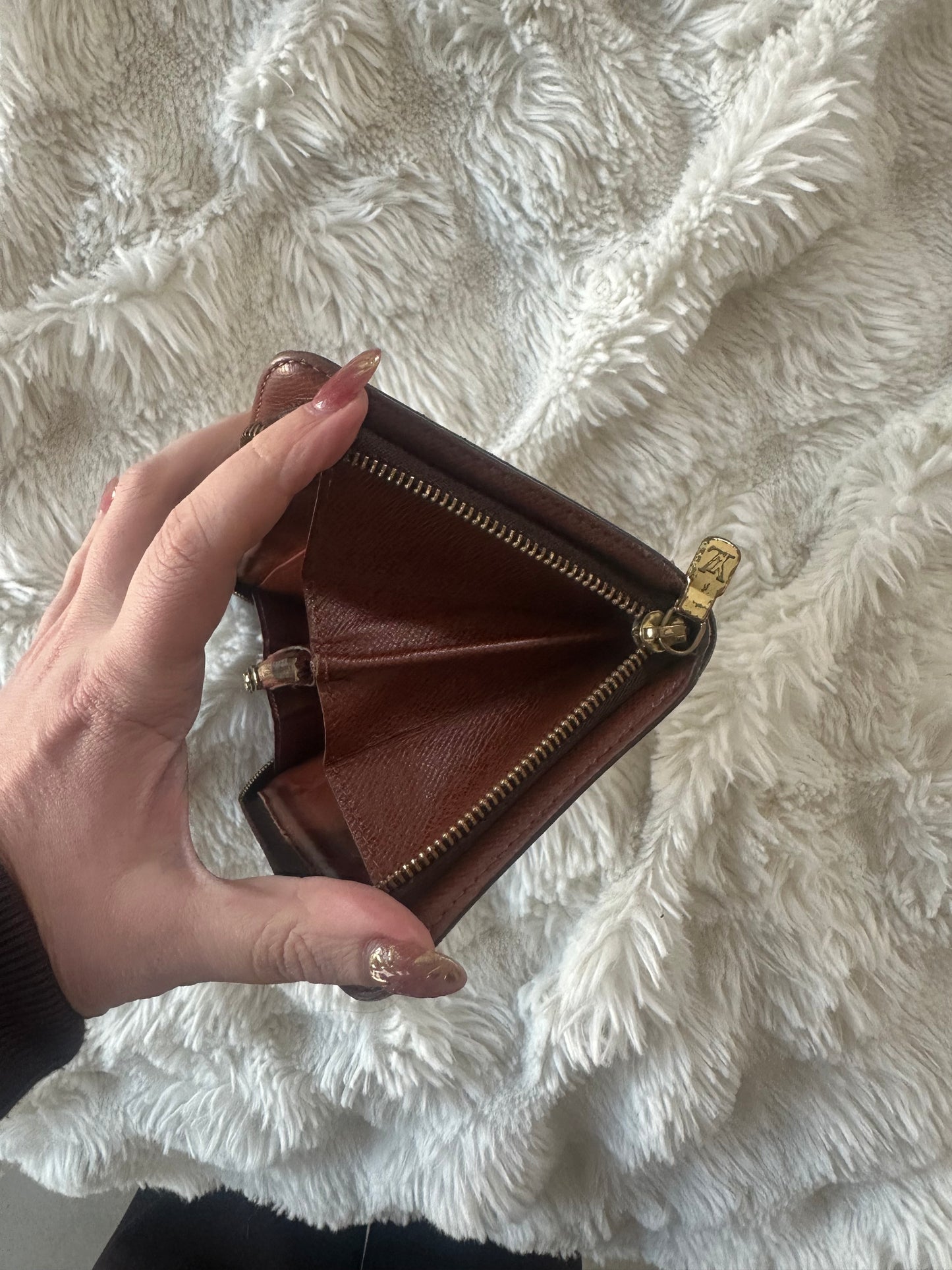 Louis Vuitton zippy wallet with zip coin pocket.
