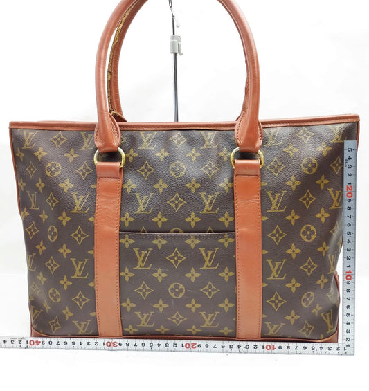 Louis Vuitton - weekender tote bag in LV monogram