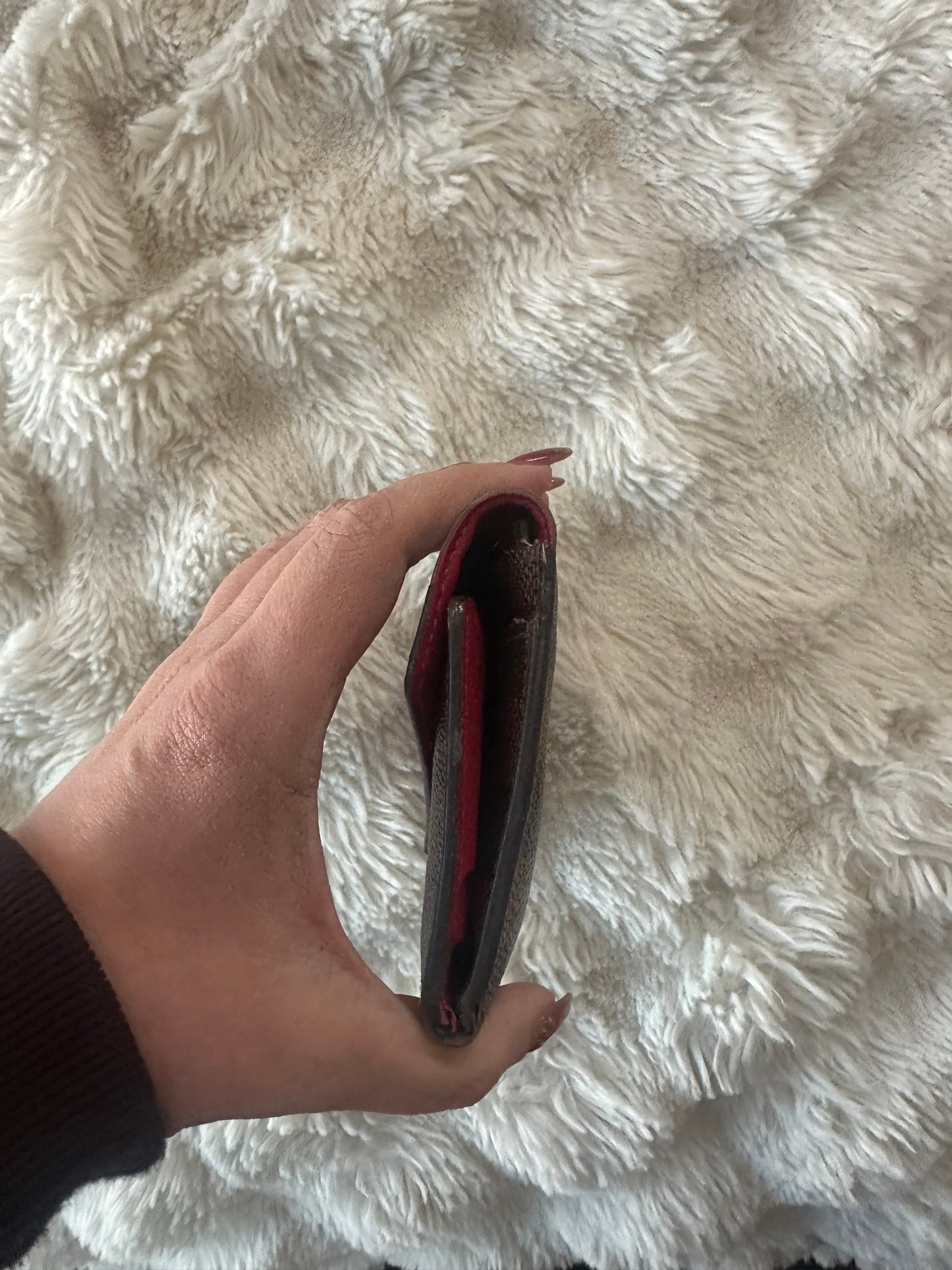 Louis Vuitton Damier Ebene wrap wallet with coin purse
