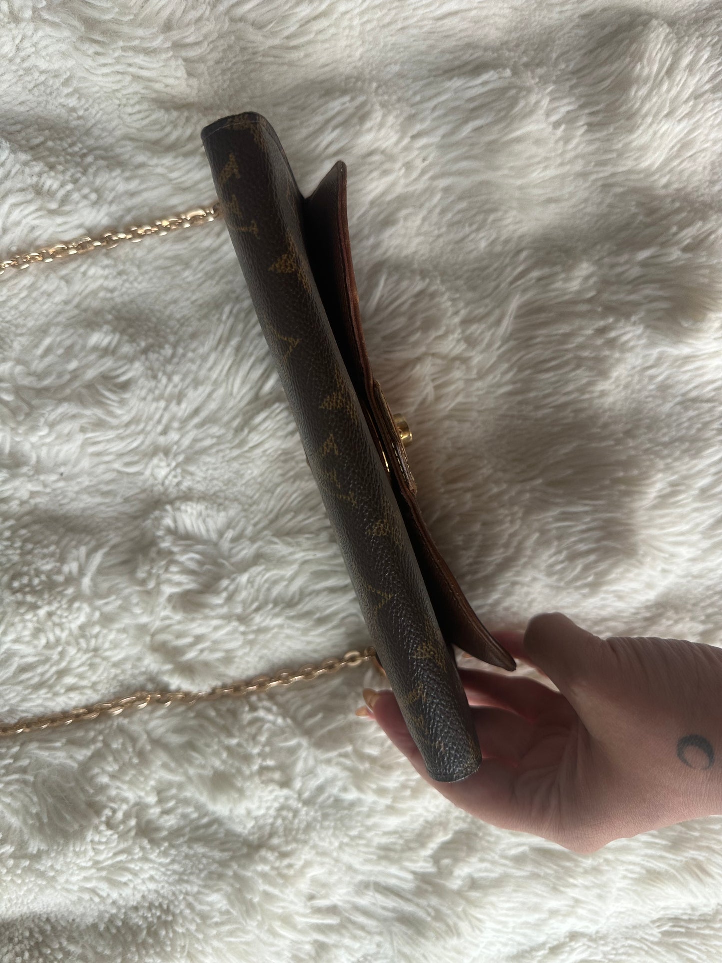 Louis Vuitton vintage boetie monogram with brass lock on chain crossbody bag.