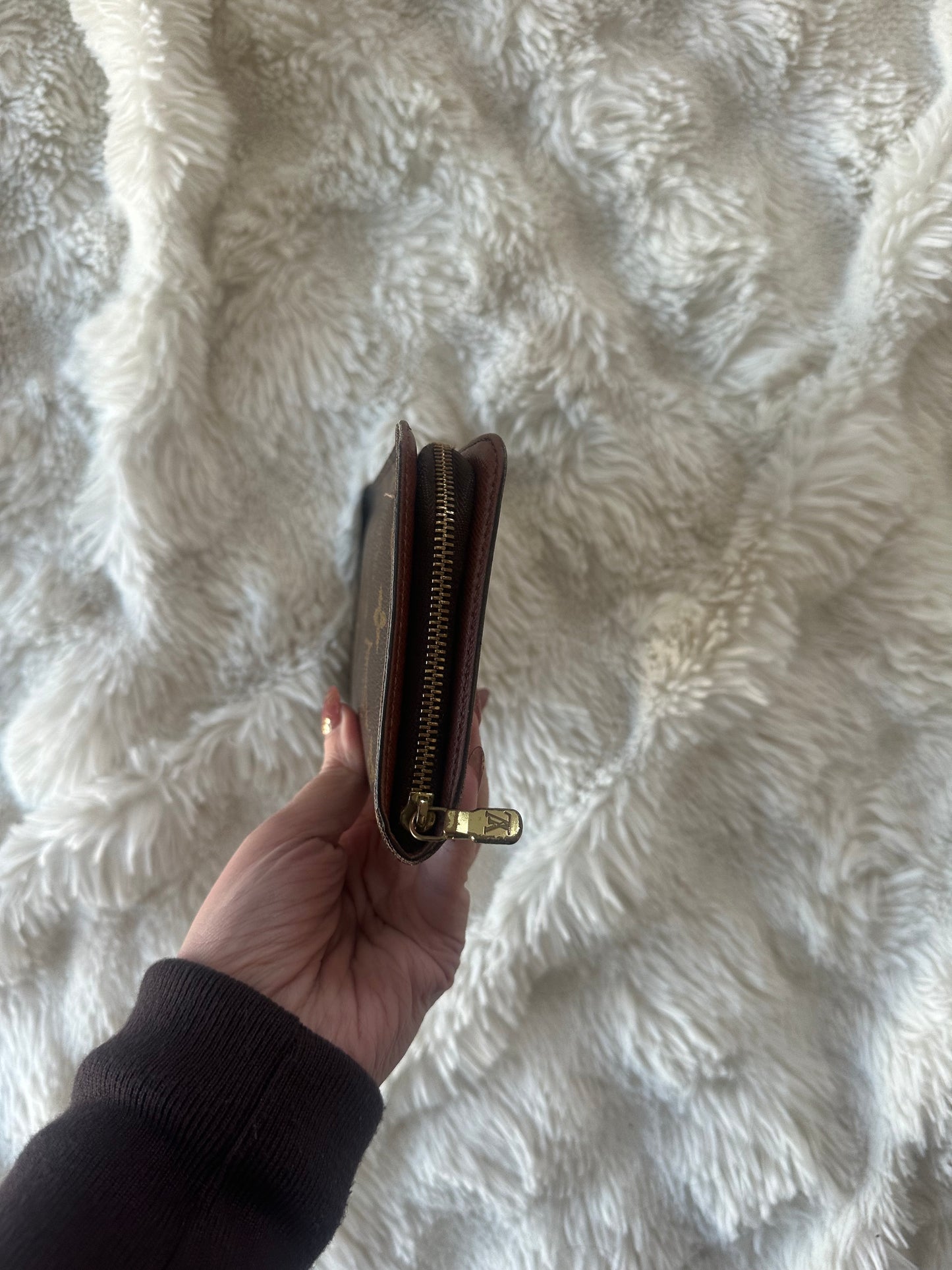 Louis Vuitton zippy wallet with zip coin pocket.