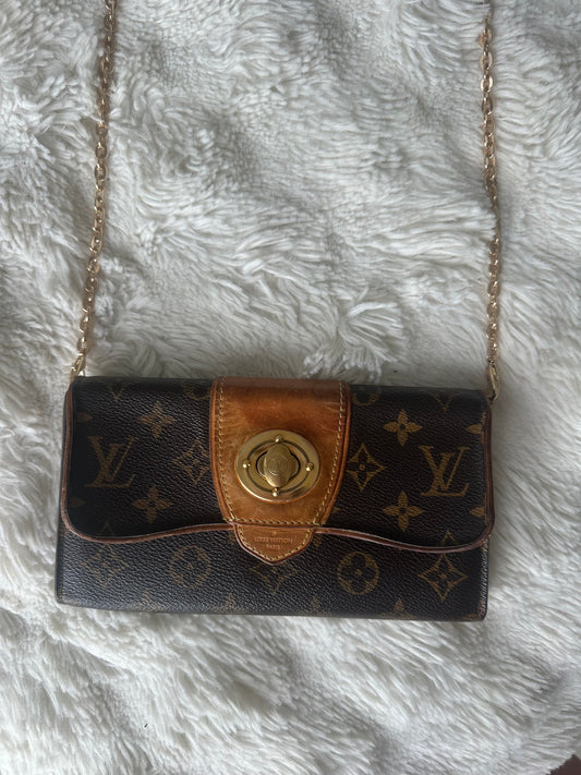 Louis Vuitton vintage boetie monogram with brass lock on chain crossbody bag.