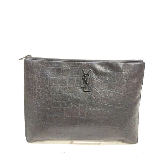 Saint Laurent black leather croc print clutch bag.