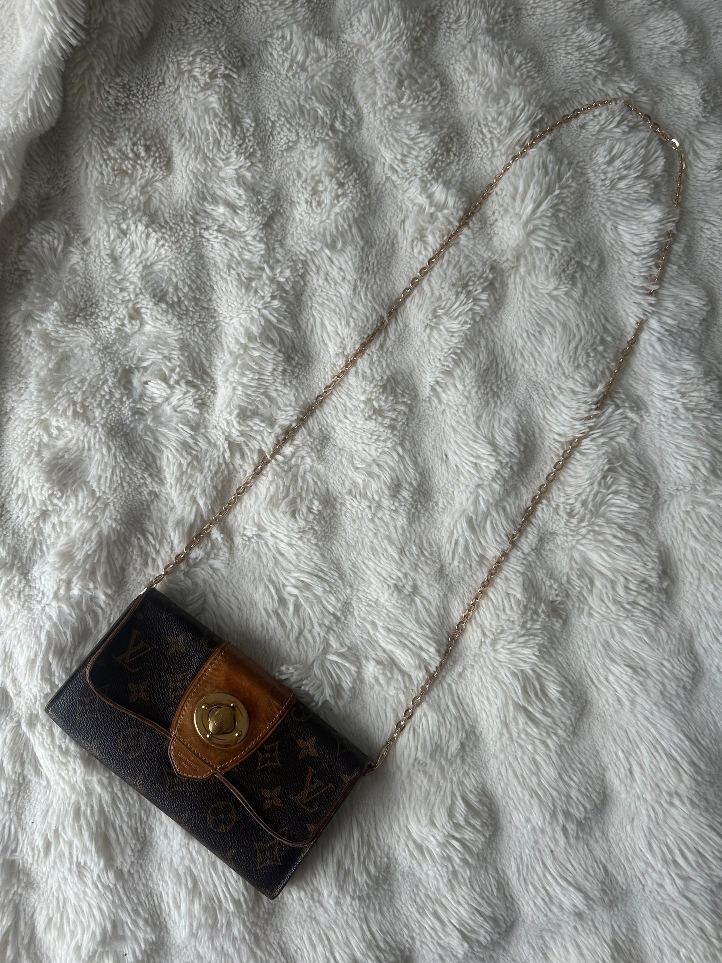 Louis Vuitton vintage boetie monogram with brass lock on chain crossbody bag.