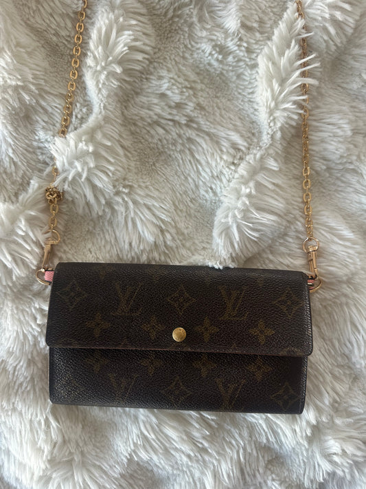 Louis Vuitton monogram wallet on chain shoulder bag.