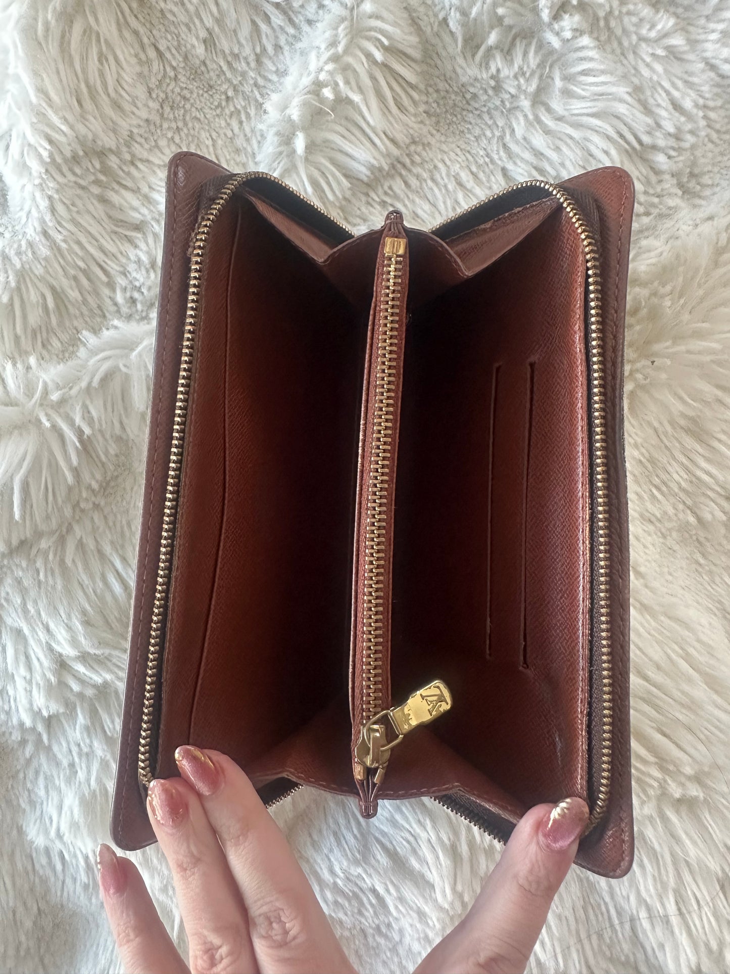 Louis Vuitton zippy wallet with zip coin pocket.