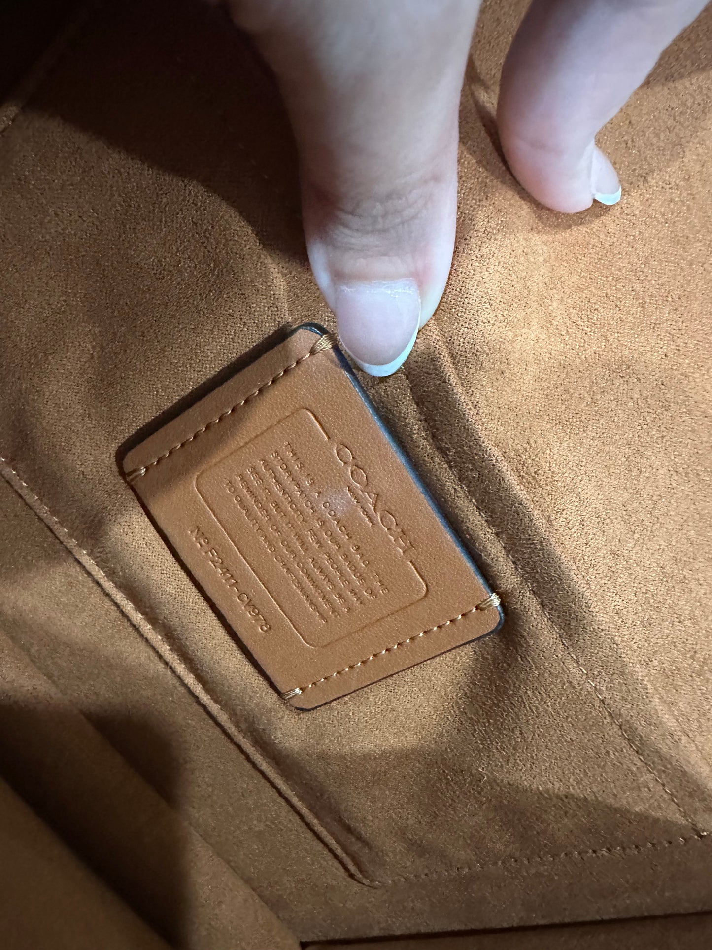 Coach Klare black leather and tan canvas crossbody