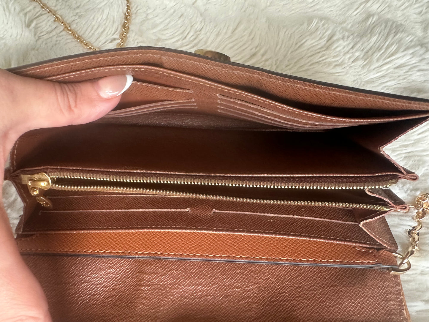 Louis Vuitton vintage boetie monogram with brass lock on chain crossbody bag.