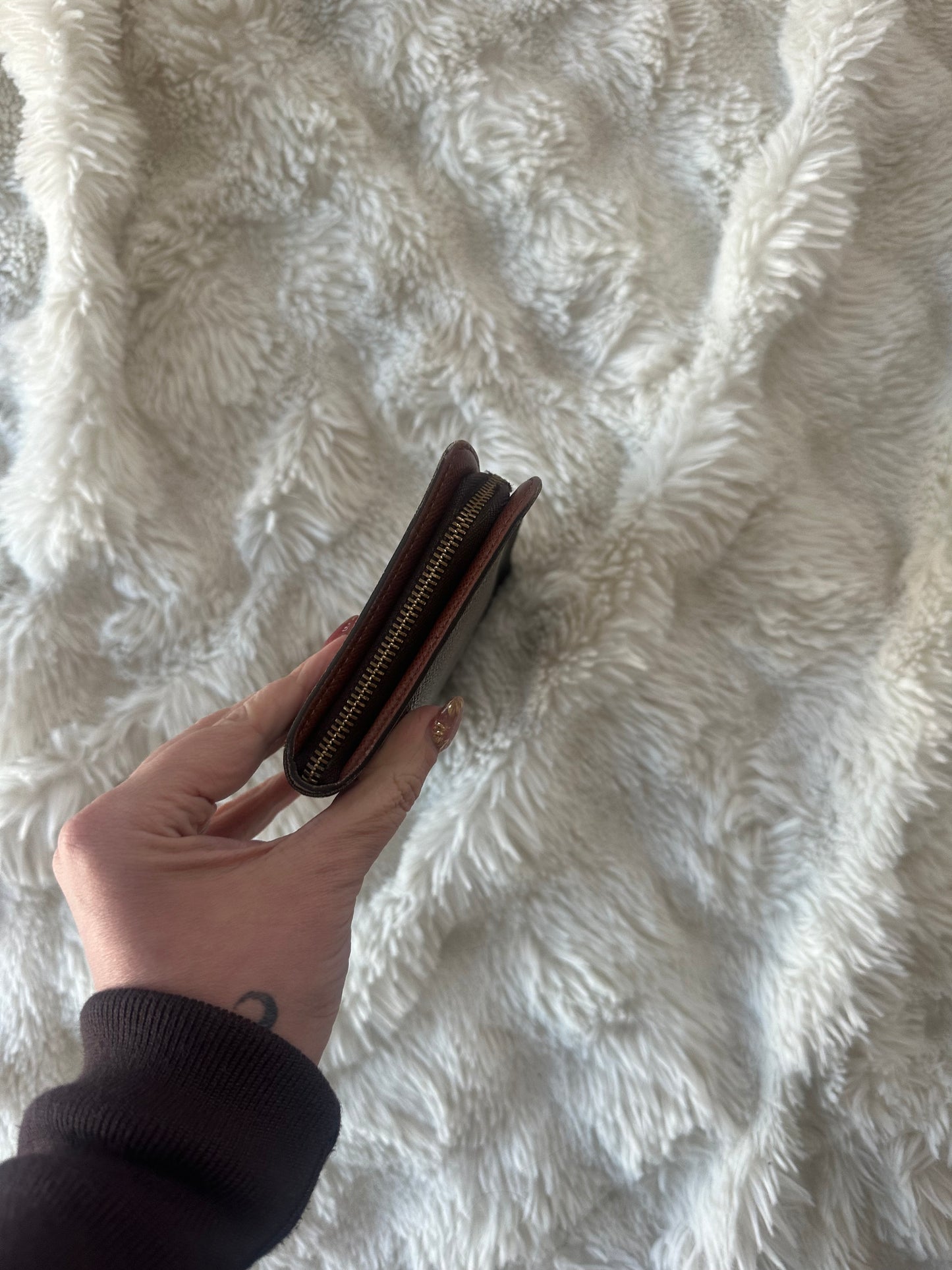Louis Vuitton zippy wallet with zip coin pocket.