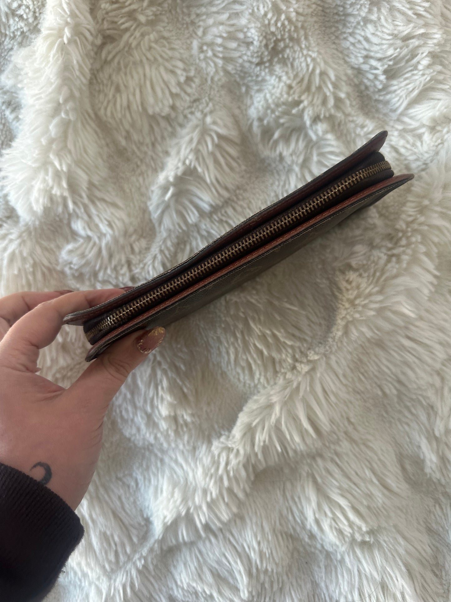 Louis Vuitton zippy wallet with zip coin pocket.