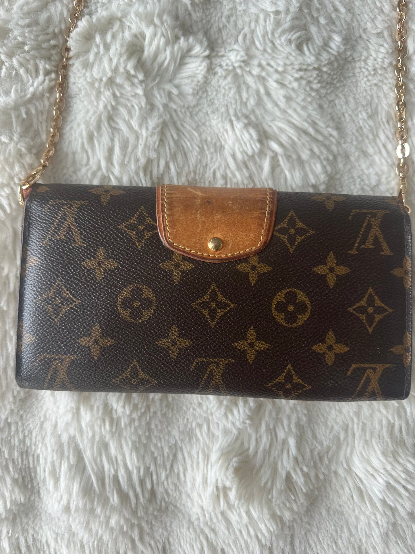 Louis Vuitton vintage boetie monogram with brass lock on chain crossbody bag.